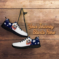 White and blue low-top sneakers with eagle patch and star pattern, black outsole, pair