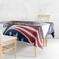 White tablecloth with large red-white stripes and blue star pattern on table