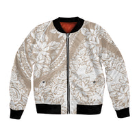 Beige bomber jacket with white tropical floral print, front zip, ribbed cuffs and hem