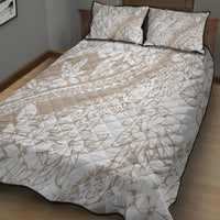 Beige floral quilt with two pillow shams, geometric leaf pattern