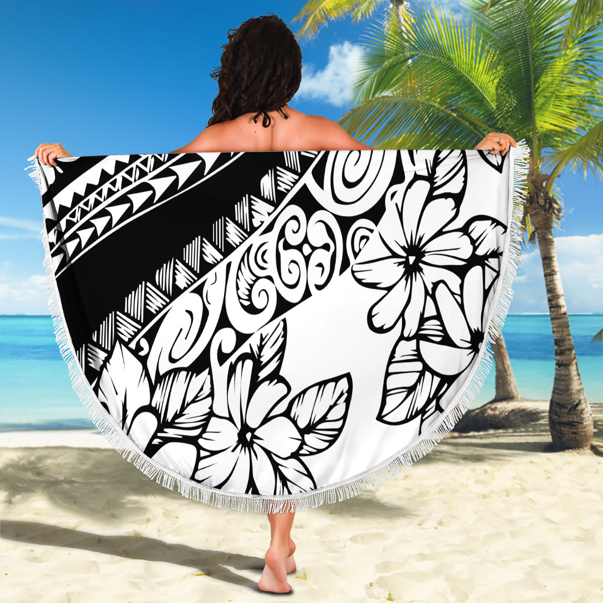 Round tropical print beach blanket in black and white with fringed trim