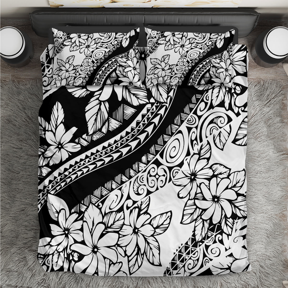 Black-and-white floral bedding set with tribal swirl and leaf patterns on duvet cover