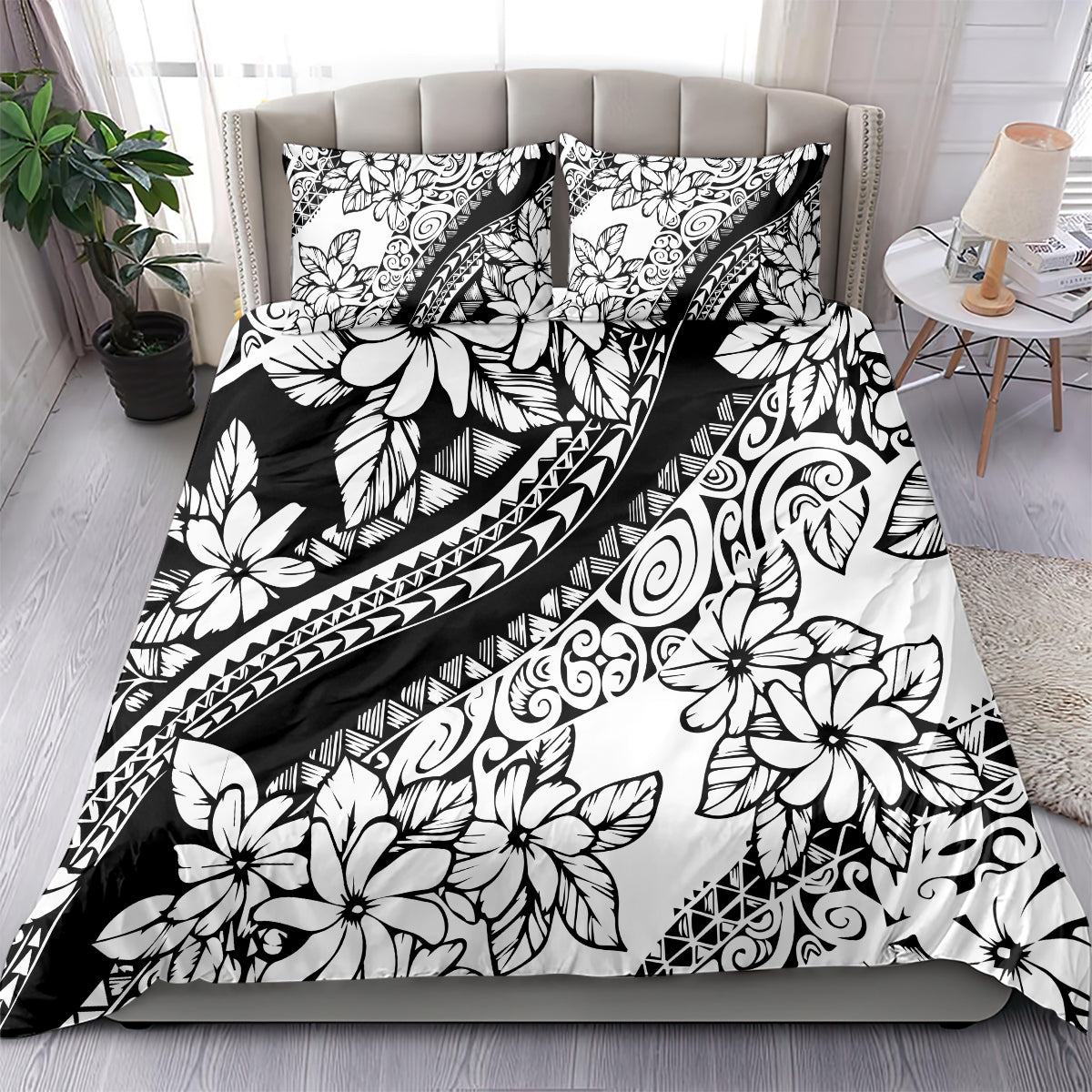 Black-and-white tropical floral bedding set with two matching pillowcases and tribal patterns