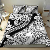 Black-and-white floral bedding set with two pillowcases, tribal stripe and swirl motifs