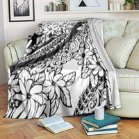 Black and white tropical flower throw blanket with ornate tribal patterning