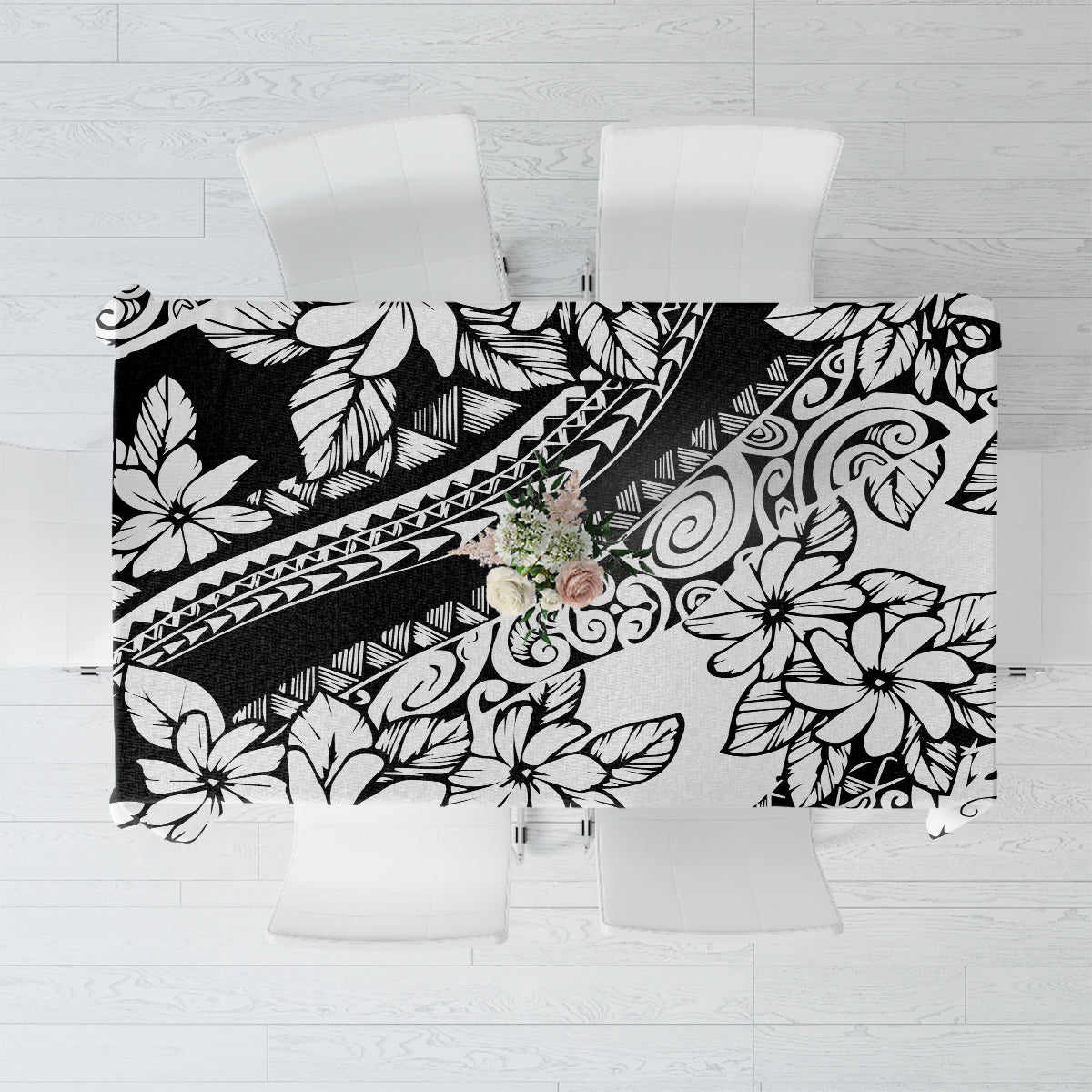 Black-and-white tropical floral tablecloth with bold geometric border