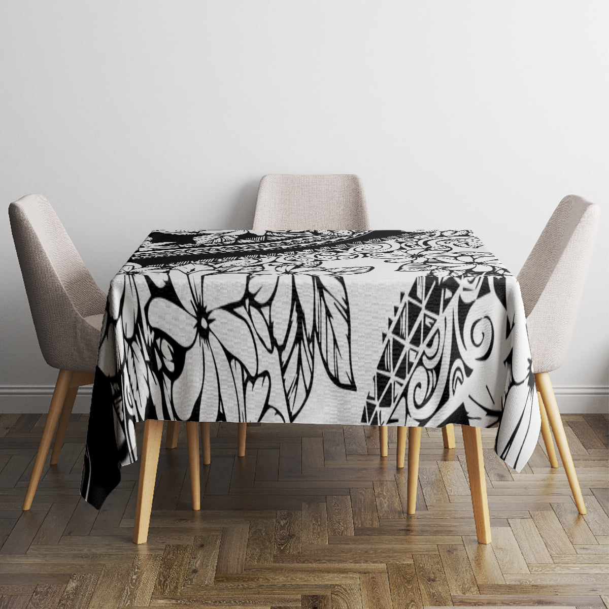 Black-and-white floral tablecloth on dining table with chair corners