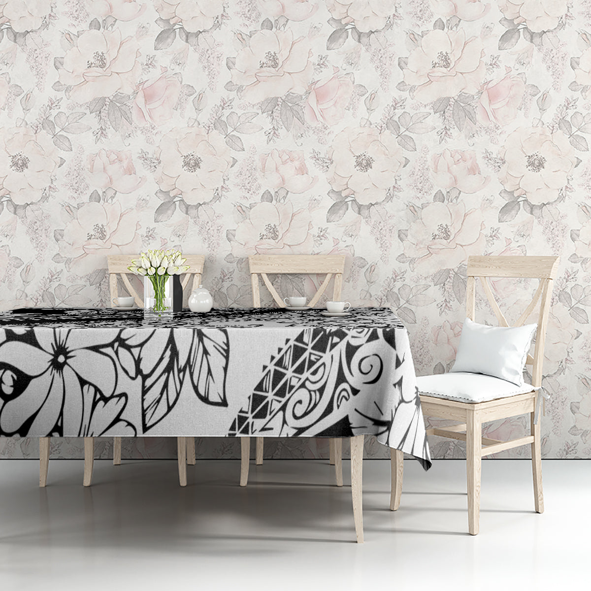 Black-and-white floral tablecloth with graphic leaves pattern
