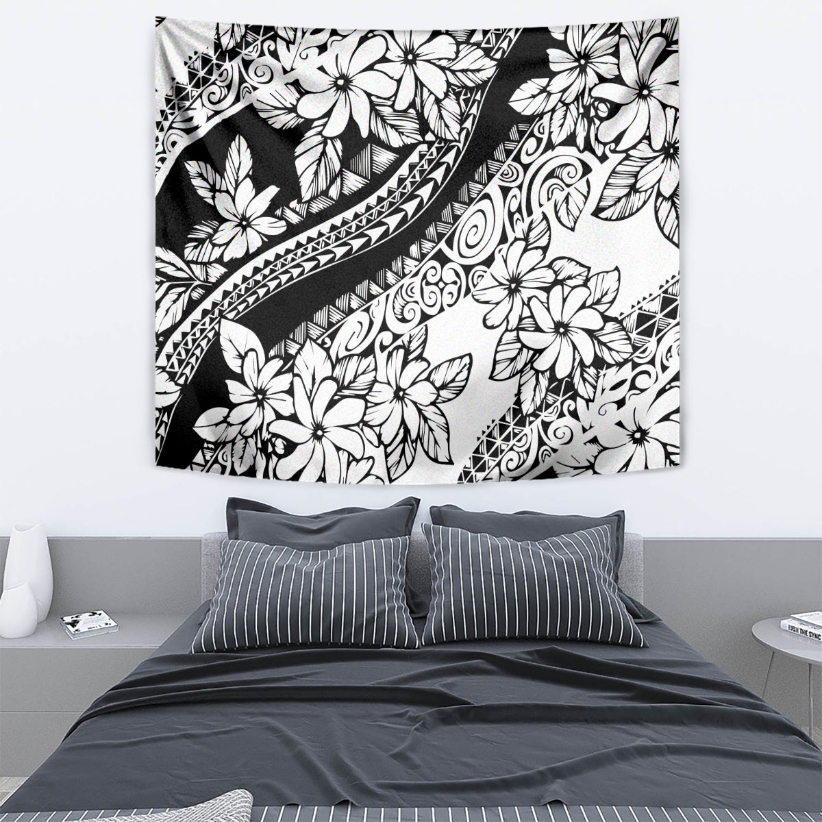 Black-and-white floral tapestry featuring geometric borders and ornate leaf motifs