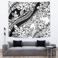 Black and white floral wall tapestry with decorative swirls and leaf-and-flower layout