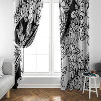 Black and white floral window curtain panels framing a white door window, floor-length