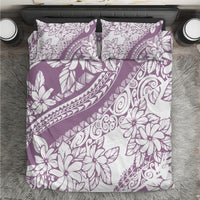 Purple floral bedding set with patterned duvet and two matching pillowcases