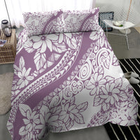 Purple patterned duvet with large tropical flowers and matching pillowcases