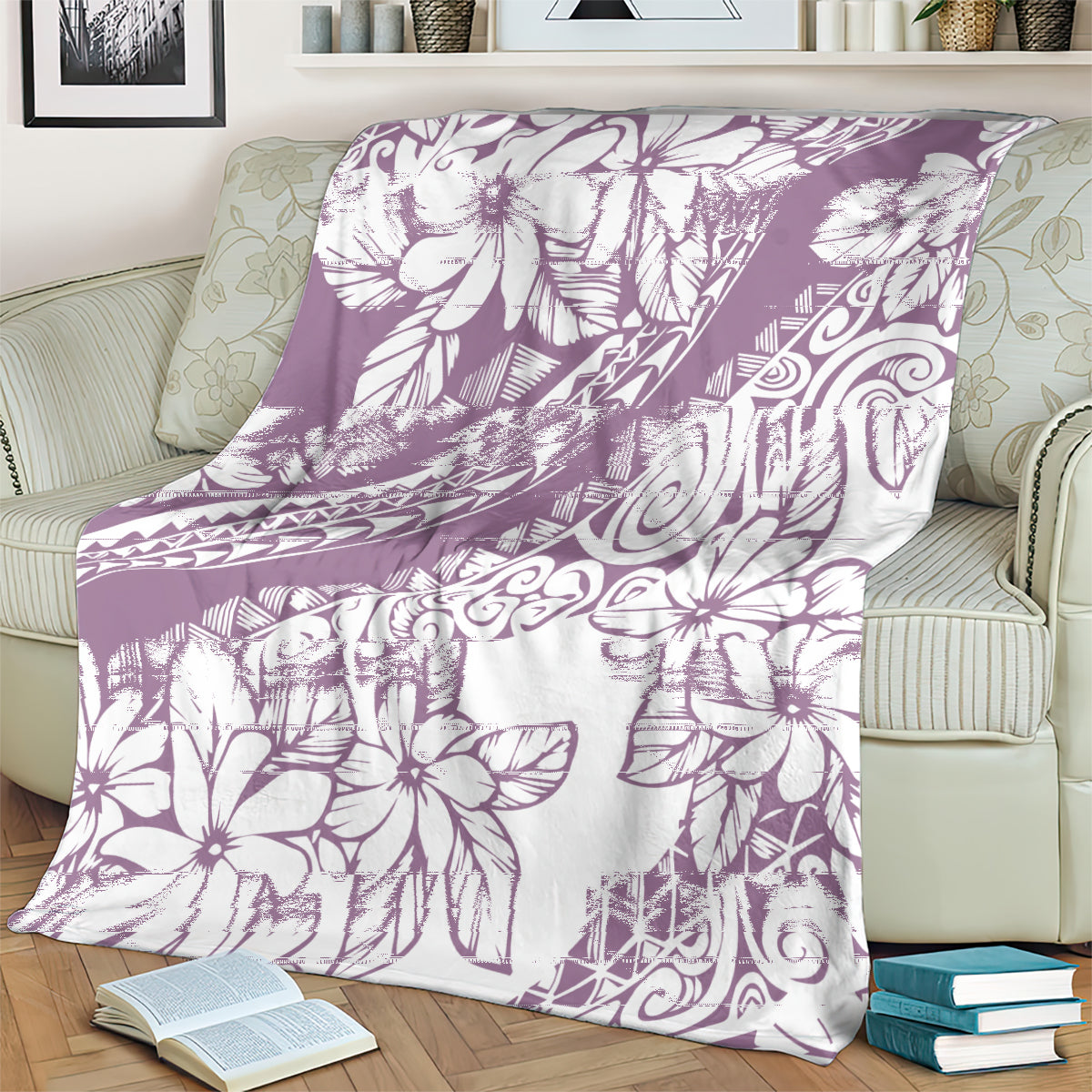 Purple and white Polynesian floral blanket folded on an armchair