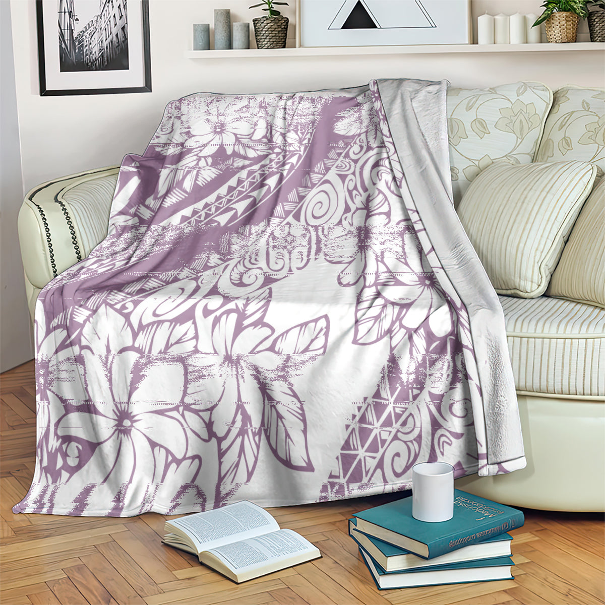 Purple and white Polynesian floral throw blanket draped across a couch