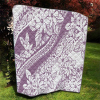 Purple and white quilt with large tropical flower prints, diamond quilt stitching, black trim
