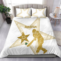 White duvet cover set with two pillowcases, gold Pakistan text and cricket player print