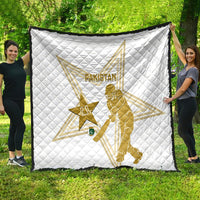 White Pakistan cricket quilt with gold star and cricketer design, shown fully spread, black border.