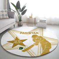 Round carpet with gold Pakistan cricket silhouettes and star, with PAKISTAN text