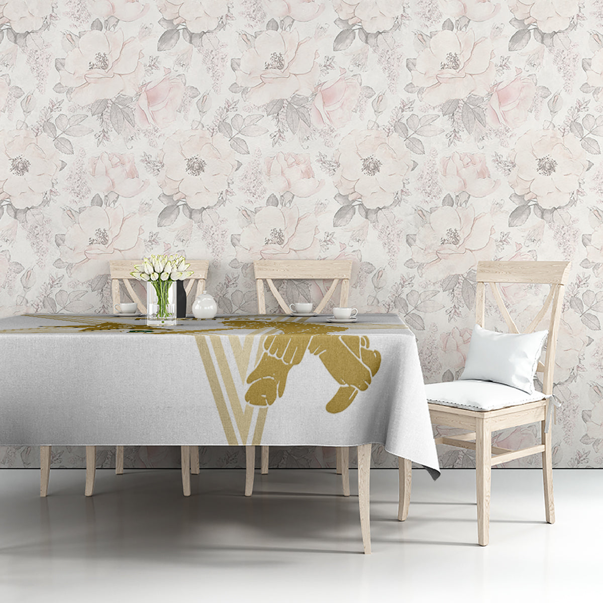 White tablecloth with gold cricket player graphic on a rectangular dining table edge