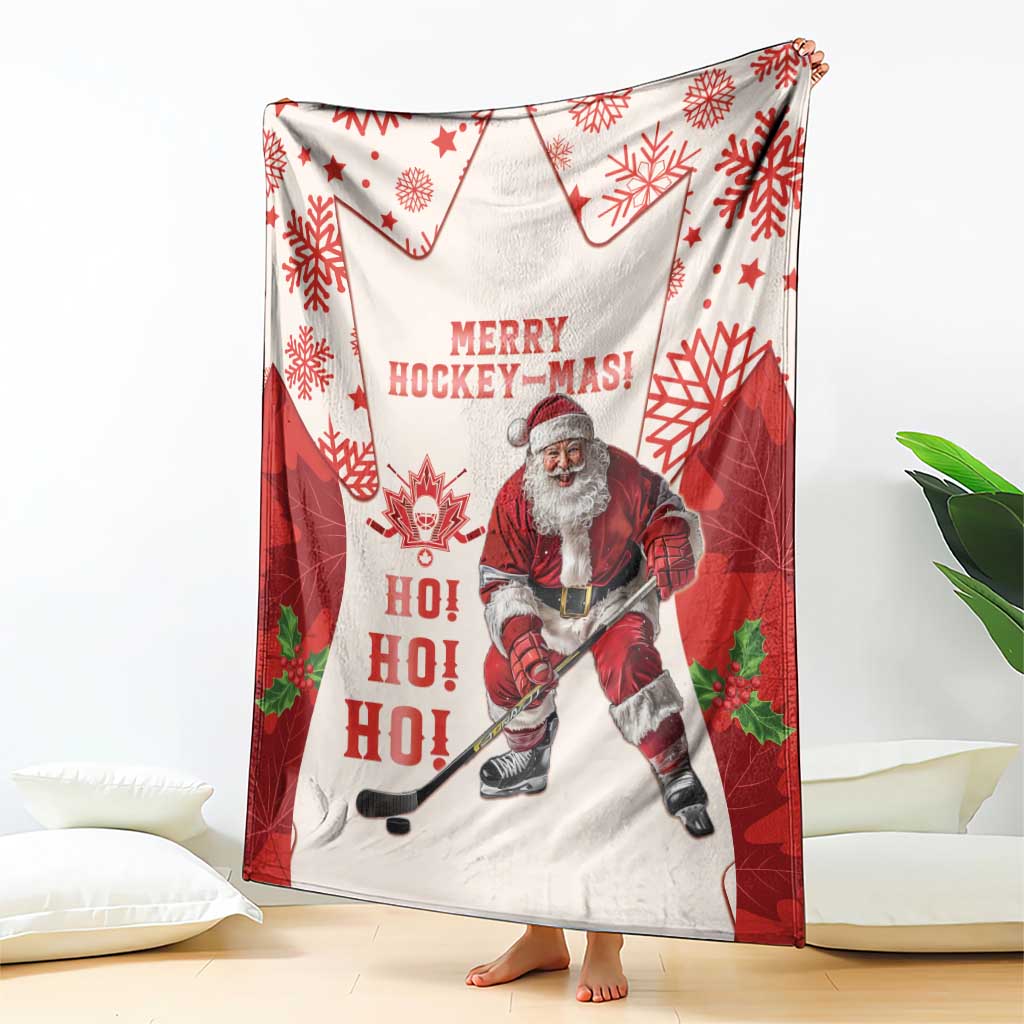 Red and white Merry Hockey-Mas blanket featuring Santa ice hockey and snowflake graphics