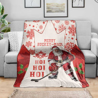 Red and white Santa hockey holiday throw blanket with HO HO HO text and maple leaf accents