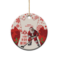 Red hockey-themed ceramic Christmas ornament with Santa and maple leaf pattern, circle shape