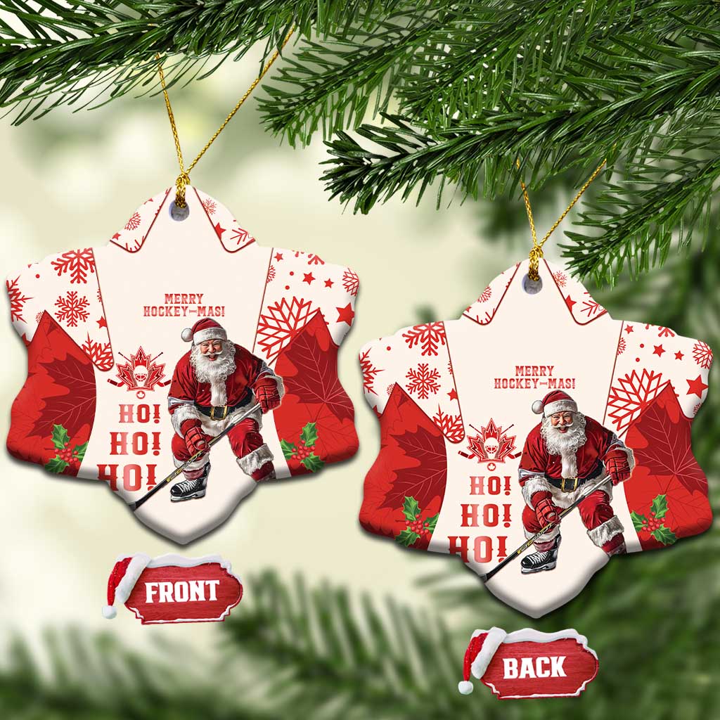 Red hockey-themed ceramic Christmas ornament with Santa and maple leaf pattern, bell shape