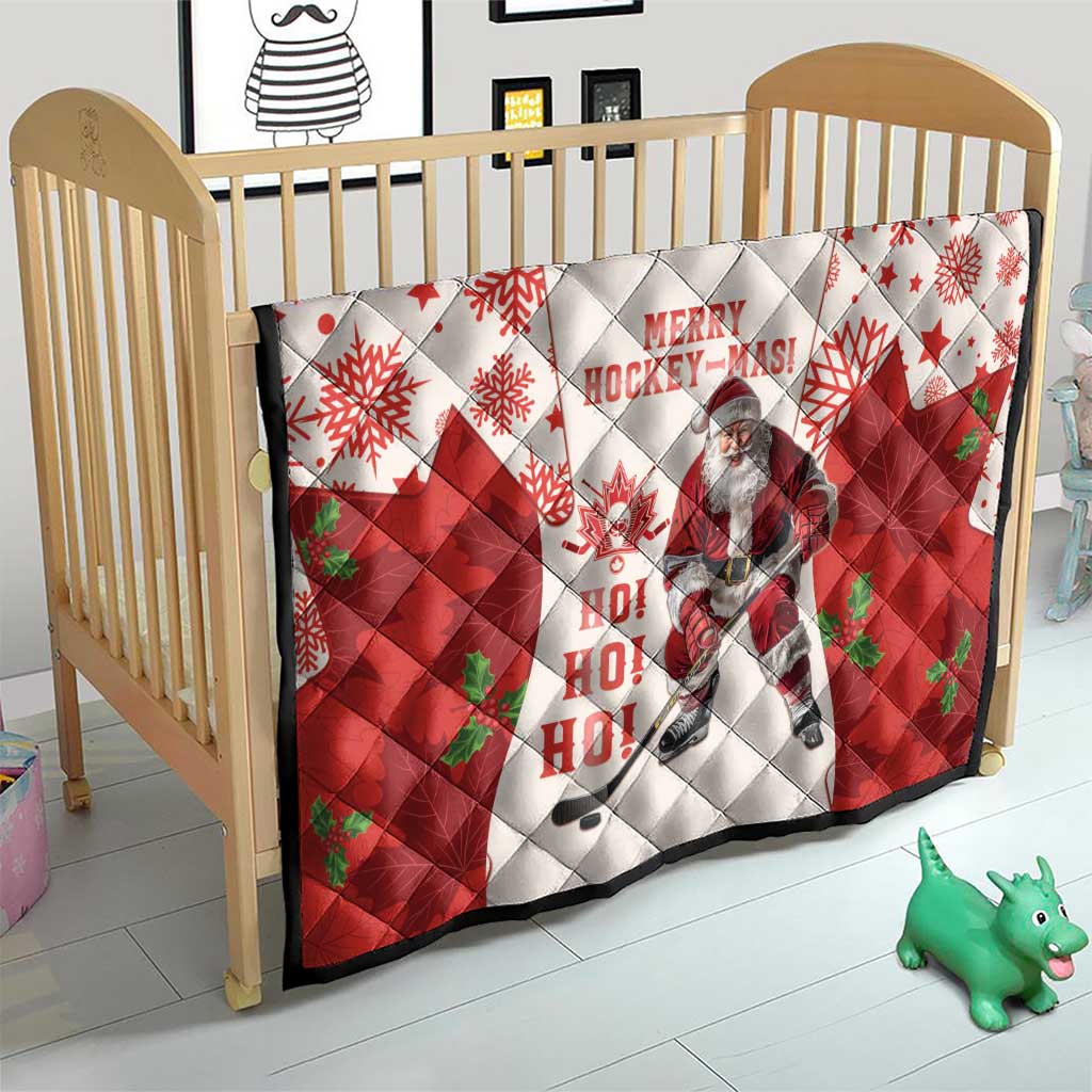 Christmas hockey quilt on a wooden crib: red and white with maple leaves and Santa graphic