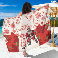 Red and white hockey-themed Christmas sarong with Santa, snowflakes, and maple leaves