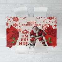 Christmas hockey tablecloth in red and white with “Merry Hockey-Mas” and Santa design