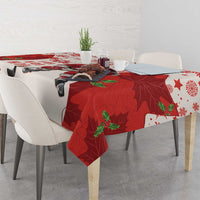 Red and white hockey tablecloth draped on dining table with leaf and star patterns