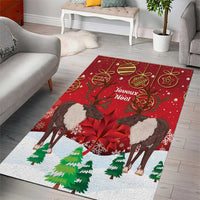 Red Christmas area rug with caribou, green pine trees, and 'Joyeux Noel' lettering