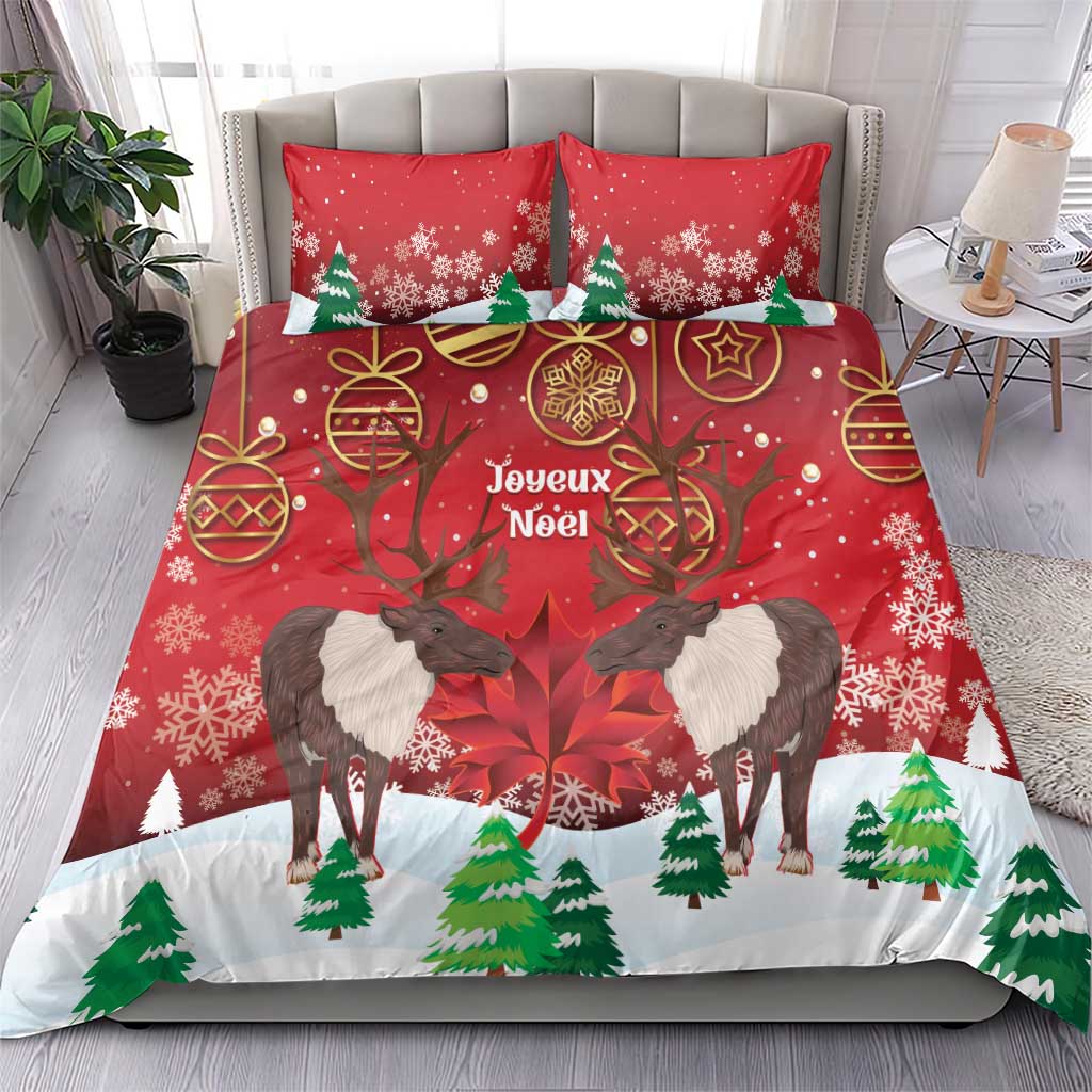 Red duvet cover and matching pillows with reindeer, pine trees, and snowflake pattern.