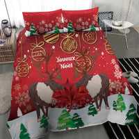 Christmas Canada bedding set in red with caribou, maple leaf, and snowflake print