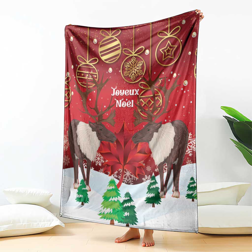Christmas Canada blanket with red caribou and maple leaf print