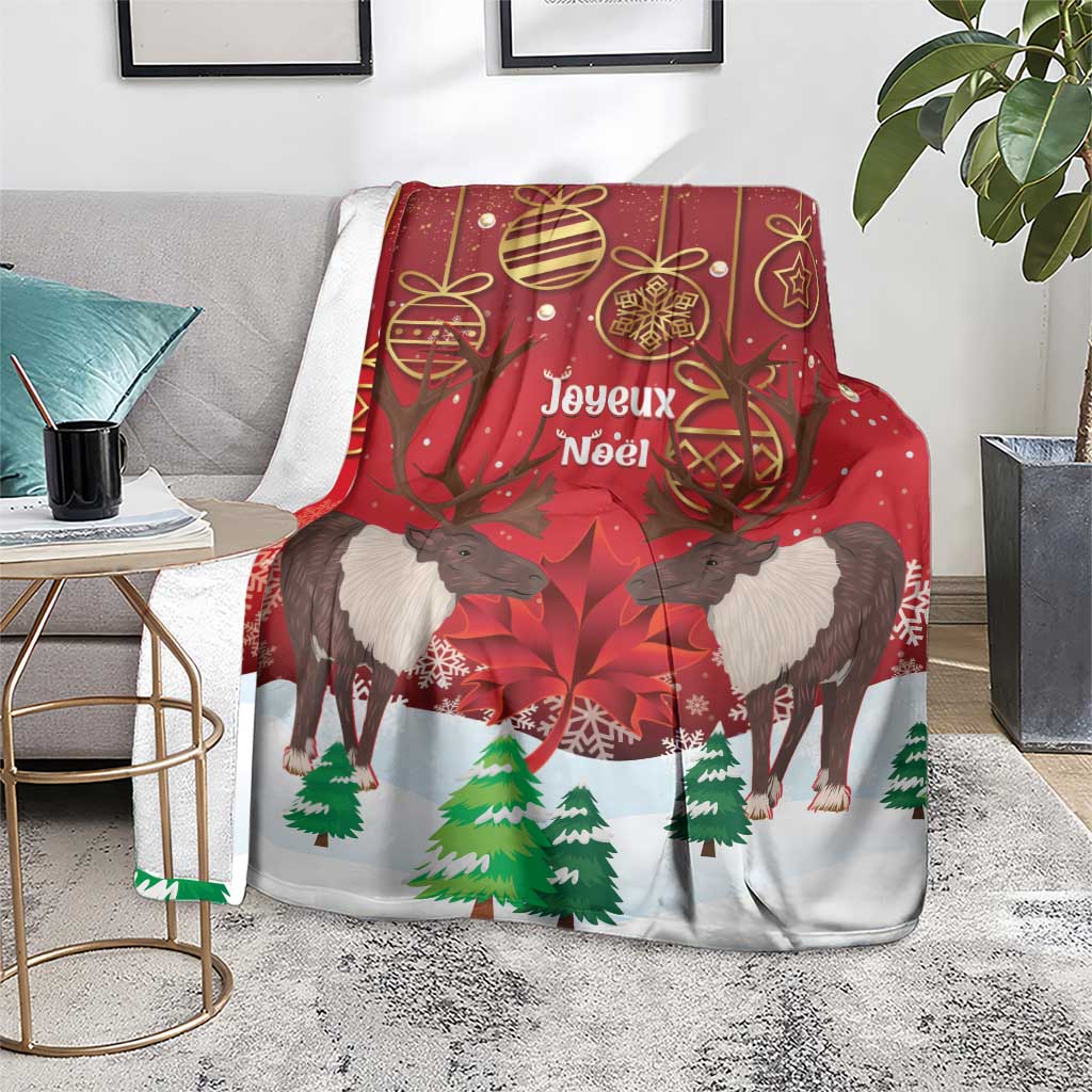 Christmas blanket on a living room floor with caribou, evergreen trees, and red ornaments