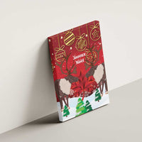 Canvas wall art with red Christmas caribou, maple leaf, and Joyeux Noel text