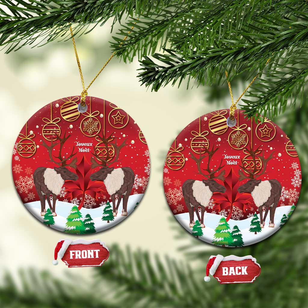 Red ceramic Christmas ornament with caribou scene, round shape, gold hanging loop, front/back tags