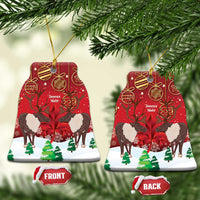 Set of red round ceramic Christmas ornaments with caribou scene, gold loops, front/back labels