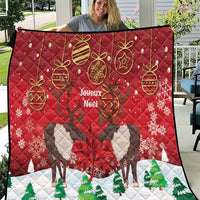 Red Christmas quilt with caribou, maple leaf, and gold ornaments, 'Joyeux Noel' center