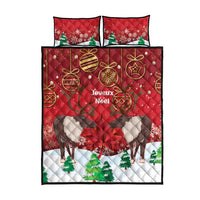 Red quilt bed set with caribou and ornaments, snowflake print, plus two pillow covers