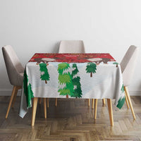 Red square Christmas tablecloth with pine tree and caribou design.