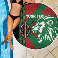 Round fringe-edged beach blanket beside pool, green-red lion graphic with “YOUR TEXT”