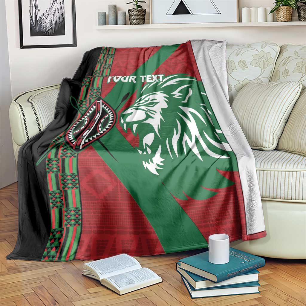 Custom rugby blanket with red, green, and black African pattern and lion head design