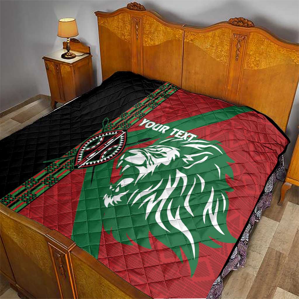 Red and green quilt with white lion graphic, black quilted backing, patterned side stripe