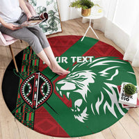 Round rug with lion head graphic, red green black tribal pattern and custom text area