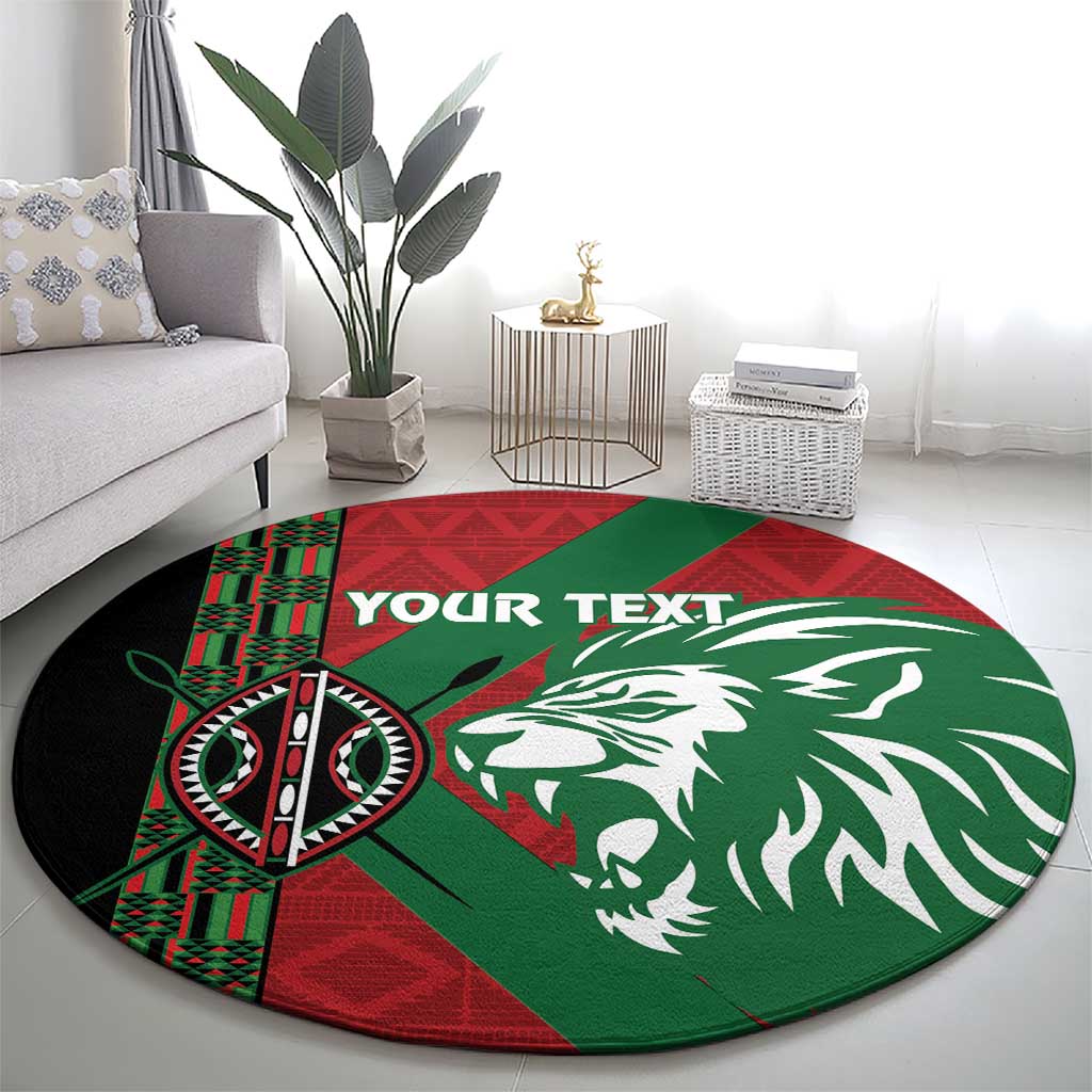 Round green and red rug with lion head and patterned emblem, shows custom text
