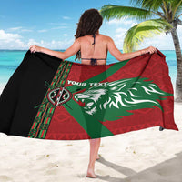 Custom sarong with red-and-green African pattern, lion head graphic and custom text