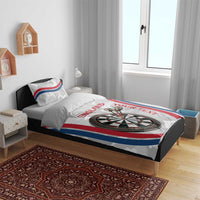 White darts bedding set on bed with England flag stripes and dartboard emblem on duvet